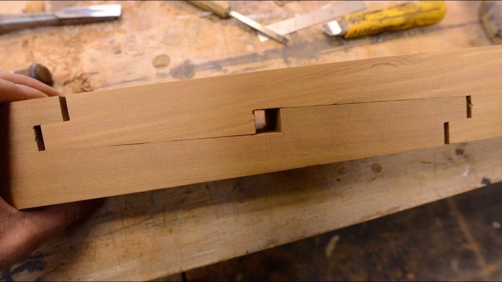neck through vs scarf joint